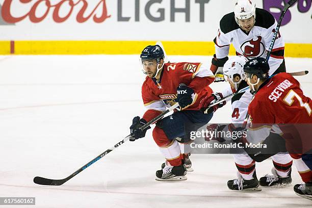 Vincent Trocheck of the Florida Panthers skates with the puck during a NHL game against the New Jersey Devils on October 13, 2016 in Sunrise, Florida.