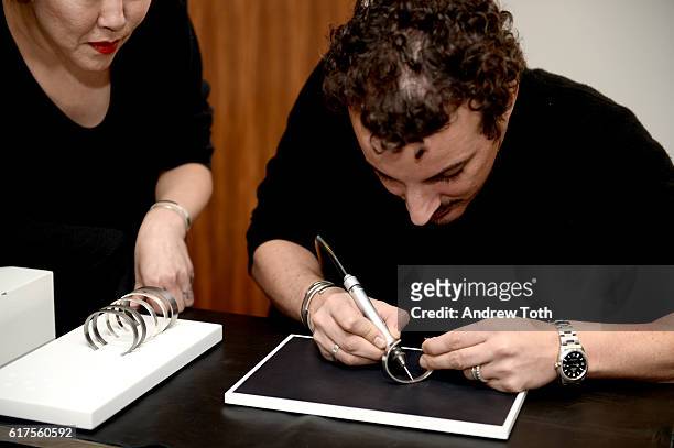 Annex Song and Nicolas Ouchenir attend Artisan Day hosted by Barneys New York on October 23, 2016 in New York City.