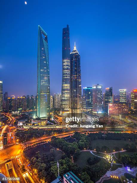 shanghai skyline - shanghai world financial center stock pictures, royalty-free photos & images