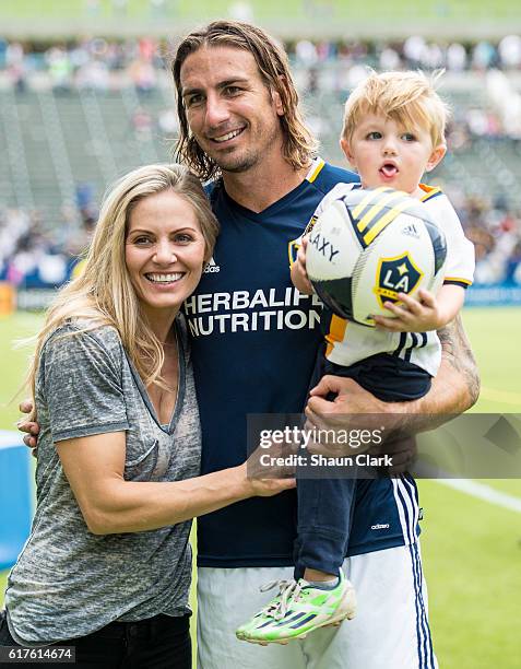 Alan Gordon of Los Angeles Galaxy and is family following the Los Angeles Galaxy's MLS match against FC Dallas at the StubHub Center on October 23,...