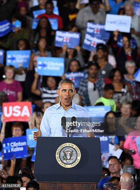 President Barack Obama speaks during a campaign rally for Democratic presidential nominee Hillary Clinton at Cheyenne High School on October 23, 2016...