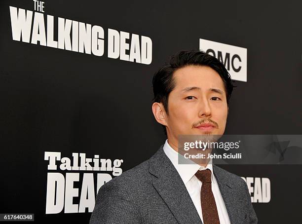 Actor Steven Yeun attends AMC presents "Talking Dead Live" for the premiere of "The Walking Dead" at Hollywood Forever on October 23, 2016 in...