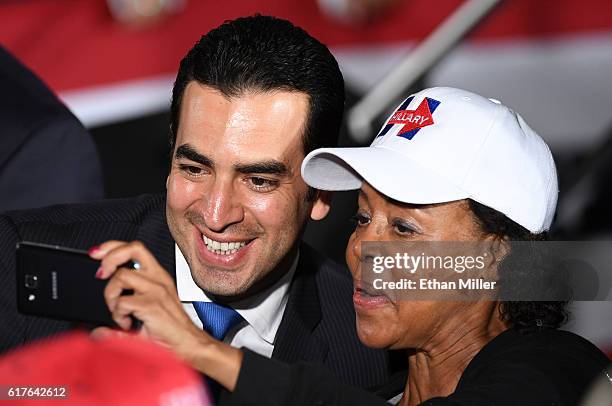 Congressional candidate and state Sen. Ruben Kihuen takes a photo with a supporter after a campaign rally with U.S. President Barack Obama for...