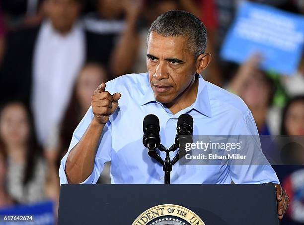 President Barack Obama speaks during a campaign rally for Democratic presidential nominee Hillary Clinton at Cheyenne High School on October 23, 2016...