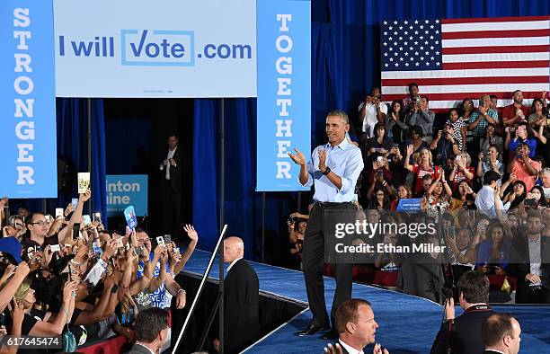 President Barack Obama reacts after speaking at a campaign rally for Democratic presidential nominee Hillary Clinton at Cheyenne High School on...