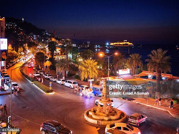 night view of the kusadasi seafront promenade - kusadasi stock pictures, royalty-free photos & images