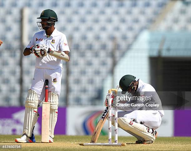 Bangladeshie batsmen Shafiul Islam and Sabbir Rahman react after losing the first Test between Bangladesh and England at Zohur Ahmed Chowdhury...