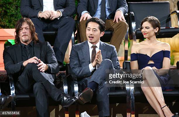 Actors Andrew Lincoln, Norman Reedus, Steven Yeun and Lauren Cohan speak onstage during AMC presents "Talking Dead Live" for the premiere of "The...