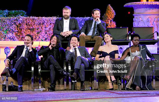 Actors Andrew Lincoln, Norman Reedus, Steven Yeun , Lauren Cohan, Danai Gurira and creator Robert Kirkman and showrunner Scott Gimple speak onstage...