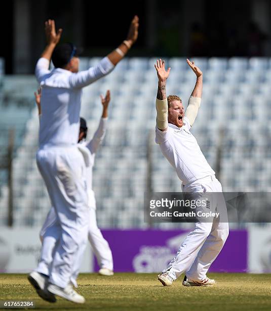 Ben Stokes of England celebrates taking the final wicket of Shafiul Islam of Bangladesh to win the first Test between Bangladesh and England at Zohur...