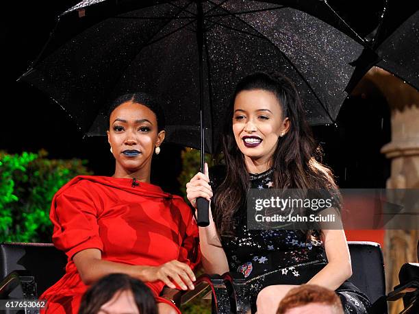 Actors Sonequa Martin and Christian Serratos speak onstage during AMC presents "Talking Dead Live" for the premiere of "The Walking Dead" at...