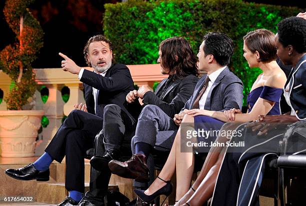 Actors Andrew Lincoln, Norman Reedus, Steven Yeun, Lauren Cohan and Danai Gurira speak onstage during AMC presents "Talking Dead Live" for the...