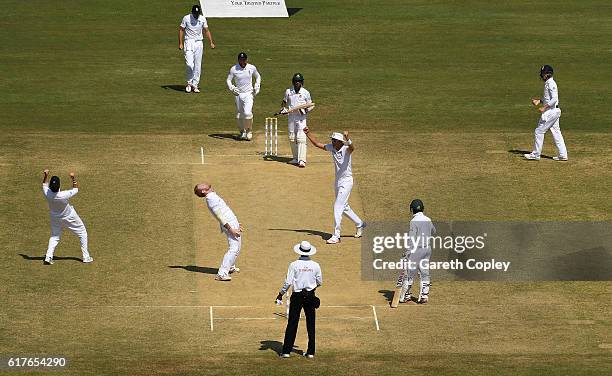 Ben Stokes of England celebrates taking the final wicket of Shafiul Islam of Bangladesh to win the first Test between Bangladesh and England at Zohur...