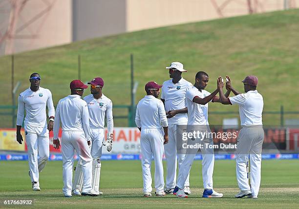 Miguel Cummins of West Indies celebrates taking the wicket of Azhar Ali of Pakistan during Day Four of the Second Test between Pakistan and West...