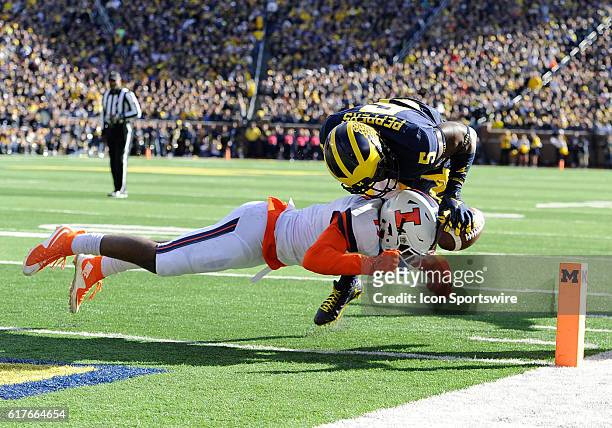 Michigan's Jabrill Peppers dives for the end zone pylon after catching a first quarter pass from quarterback Wilton Speight. Peppers was ruled to...