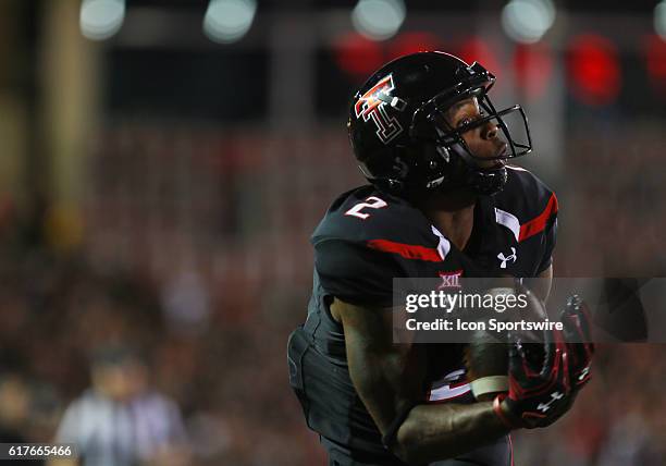 Texas Tech University wide receiver Reginald Davis III catches a touchdown pass during the Texas Tech University Red Raider's 66-59 loss to the...