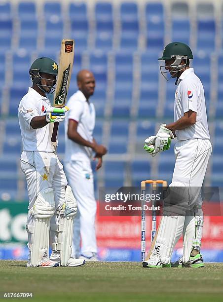 Asad Shafiq of Pakistan celebrates reaching half century during Day Four of the Second Test between Pakistan and West Indies at Zayed Cricket Stadium...