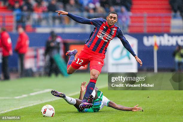 Ronny Rodelin of Caen and Henri Saivet of Saint-Etienne during the Ligue 1 match between SM Caen and AS Saint-Etienne at Stade Michel D'Ornano on...