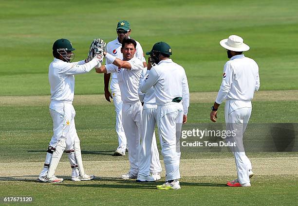 Yasir Shah of Pakistan celebrates taking the wicket of Leon Johnson of West Indies during Day Four of the Second Test between Pakistan and West...