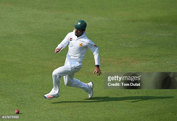 Asad Shafiq of Pakistan chases the ball during Day Four of the Second Test between Pakistan and West Indies at Zayed Cricket Stadium on October 24,...