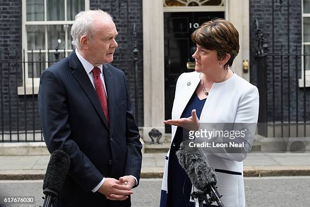 Deputy First Minister of Northern Ireland Martin McGuinness and First Minister of Northern Ireland Arlene Foster speak after a meeting between...
