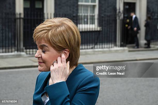 Scottish First Minister Nicola Sturgeon leaves after a meeting between British Prime Minister Theresa May and the leaders of the three devolved...