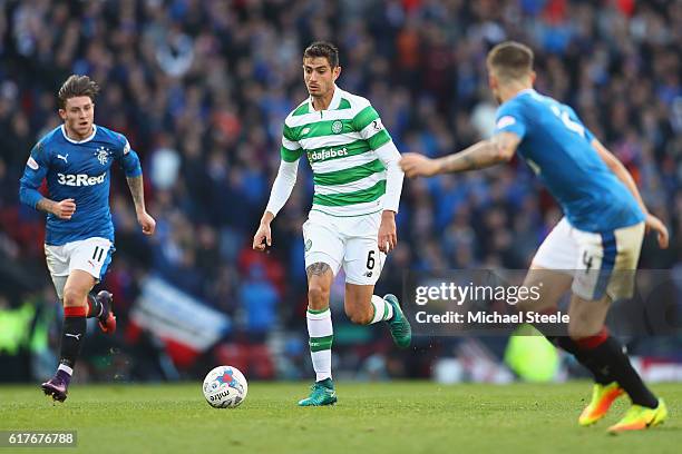 Nir Bitton of Celtic is tracked by Josh Windass and Rob Kiernan of Rangers during the Betfred Cup Semi-Final match between Rangers and Celtic at...