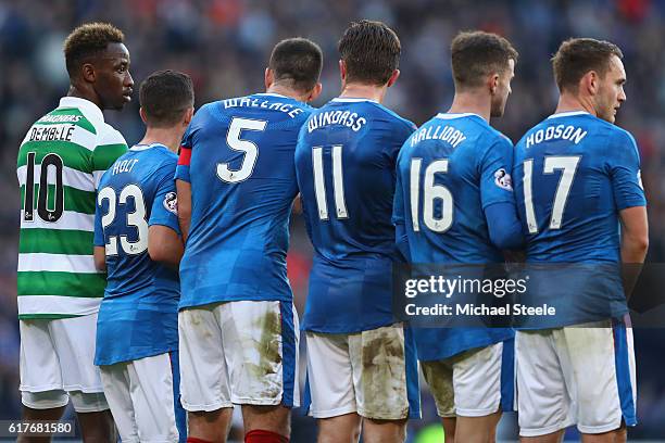 Moussa Dembele of Celtic lines up alongside Rangers players during the Betfred Cup Semi-Final match between Rangers and Celtic at Hampden Park on...