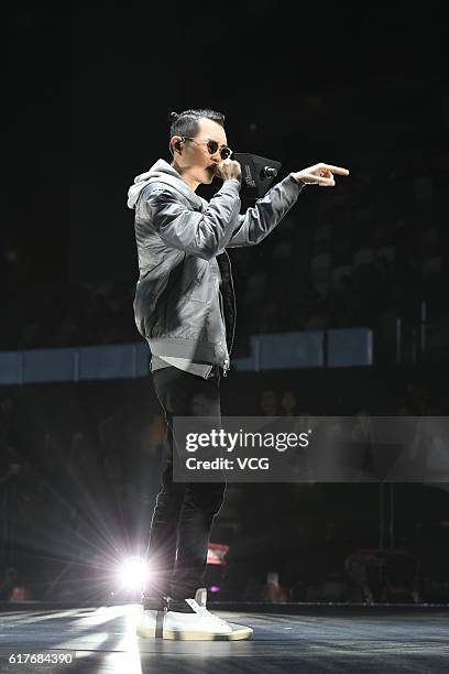 Singer Khalil Fong performs during Tmall global fashion event at Oriental Sports Center on October 23, 2016 in Shanghai, China.
