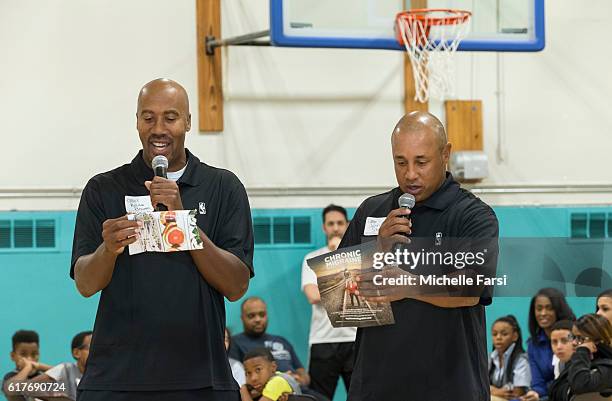 Former NBA players, John Starks and Bruce Bowen participate in the NBA Clinic at the Miccio Community Center along with the NYPD in Brooklyn, NY on...