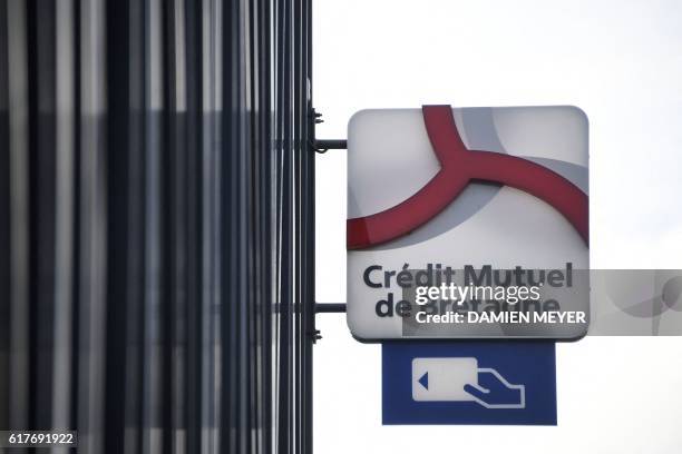 This picture, taken on october 24, 2016 shows the new logo of the French bank "Credit mutuel de Bretagne" in Cesson-Sevigne, suburb of Rennes,...