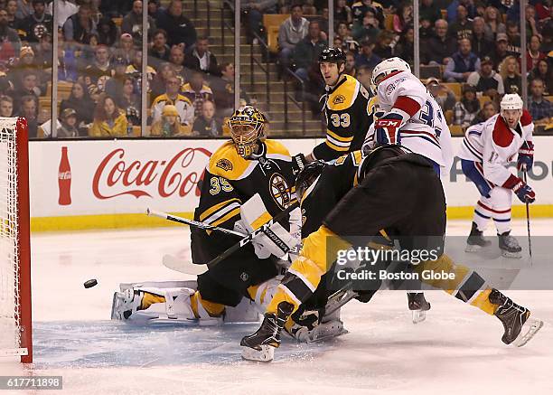 Boston Bruins goaltender Anton Khudobin watches Montreal Canadiens center Brian Flynn shot fall short of the goal during the second period at TD...