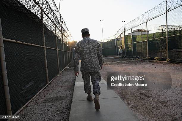 Guards walks into the "Gitmo" maximum security detention center on October 22, 2016 at the U.S. Naval Station at Guantanamo Bay, Cuba. The U.S....