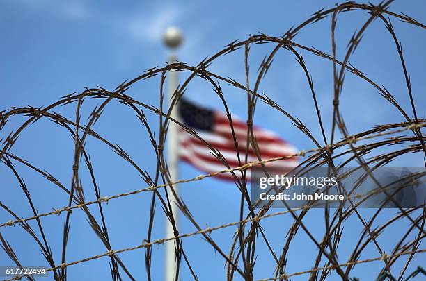 Razor wire tops the fence of the U.S. Prison at Guantanamo Bay, also known as "Gitmo" on October 23, 2016 at the U.S. Naval Station at Guantanamo...