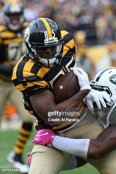 Tight End Xavier Grimble of the Pittsburgh Steelers has a long gain against the New York Jets at Heinz Field on October 9, 2016 in Pittsburgh,...