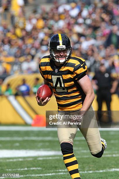 Punter Jordan Berry of the Pittsburgh Steelers runs the ball on a keeper against the New York Jets at Heinz Field on October 9, 2016 in Pittsburgh,...