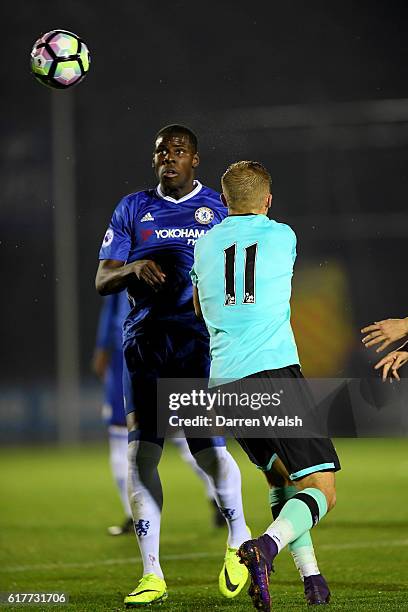 Kurt Zouma of Chelsea and Charles Vernam of Derby County during a Premier League 2 match between Chelsea and Derby County at The EBB Stadium on...