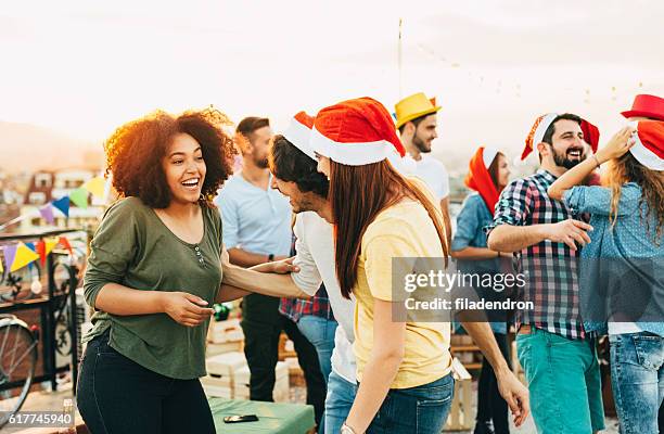 christmas party on the roof - work party stock pictures, royalty-free photos & images