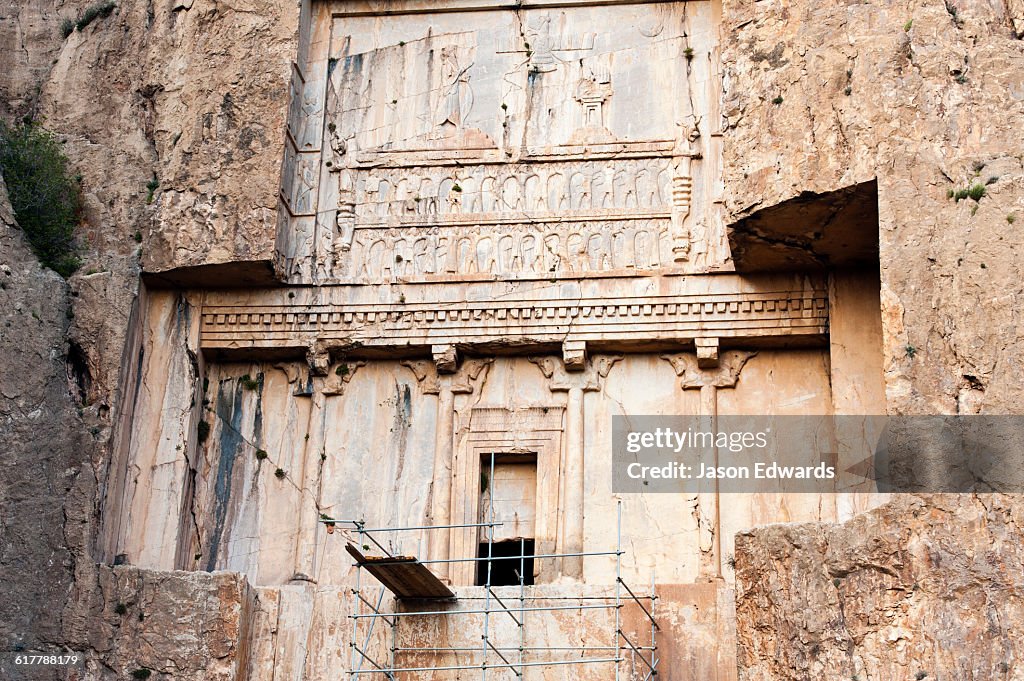 There are four tombs belonging to Achaemenid kings carved from the rock face at the archeological site of Naqsh-e Rustam also known as the Necropolis.