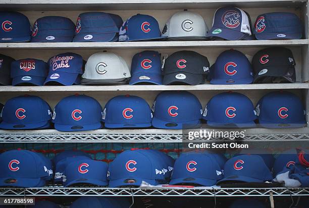 Vendor sells Chicago Cubs merchandise near Wrigley Field on October 24, 2016 in Chicago, Illinois. The Cubs will face off against the Cleveland...