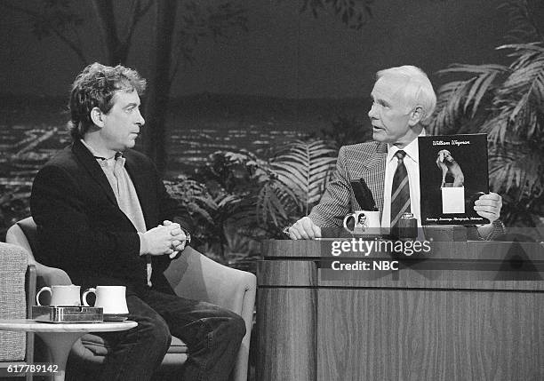 Pictured: Artist William Wegman during an interview with host Johnny Carson on January 29, 1992 --