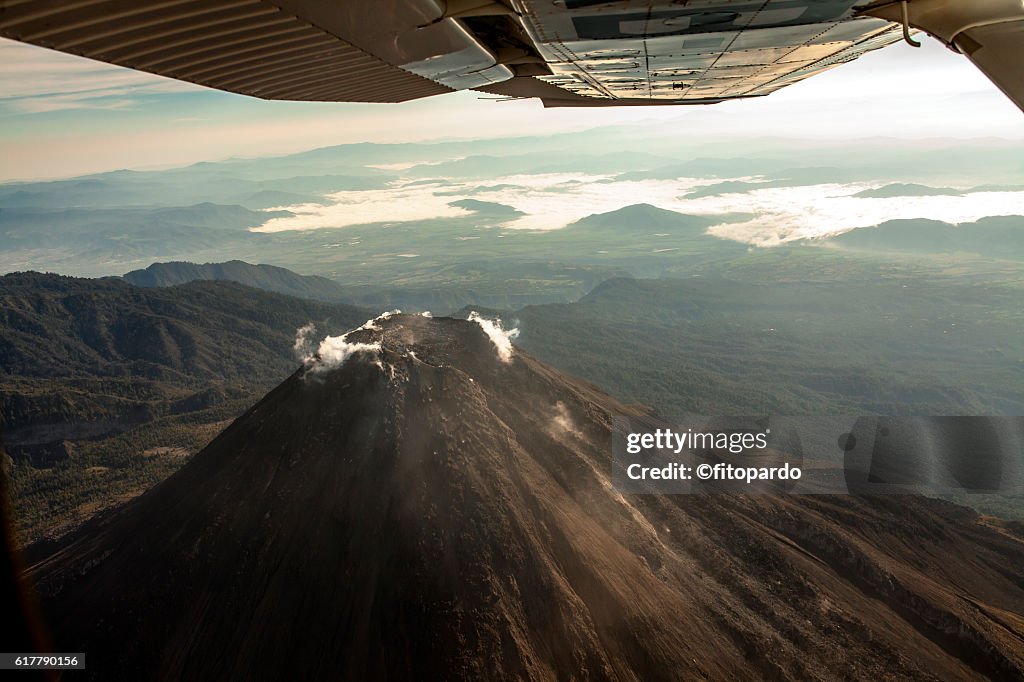 Volcán de Colima Eruptions from a plane