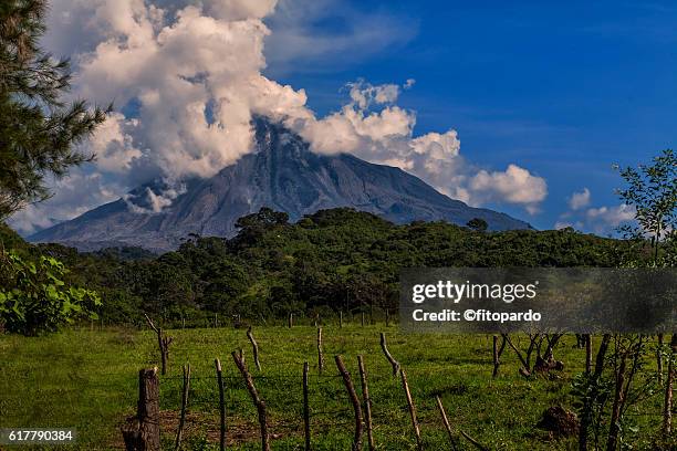 volcán de colima eruptions from a plane - volcán stock pictures, royalty-free photos & images