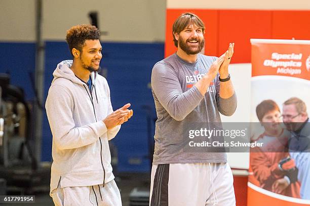 Former NBA player, Aaron Gray and Michael Gbinije of the Detroit Pistons participate in the Jr. Pistons clinic with the youth from the Special...