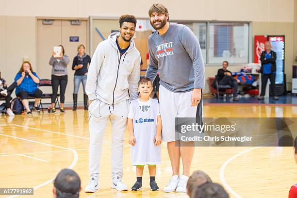 Former NBA player, Aaron Gray and Michael Gbinije of the Detroit Pistons participate in the Jr. Pistons clinic with the youth from the Special...