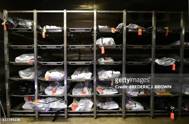 Body bags in the morgue at the Pima County medical examiner's office containing the remains of the dead, including some of those who died trying to...