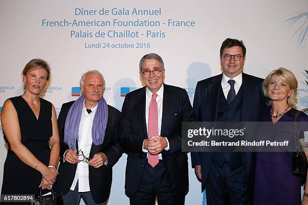 Benedicte de Puyfontaine, Photographer Yann Arthus-Bertrand, President of the "French-American Foundation France" and CEO of Vivendi, Arnaud de...