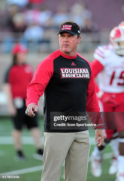 Louisiana Lafayette head coach Mark Hudspeth during warms up prior to 27 - 3 win over Texas State at Jim Wacker Field at Bobcat Stadium in San...
