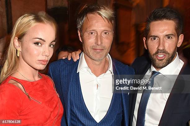 Katrina Durden, Mads Mikkelsen and Scott Adkins attend Marvel Studios and British GQ hosted reception in The Cloisters at Westminster Abbey, to...
