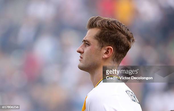 Robbie Rogers of the Los Angeles Galaxy looks on during the singing of the national anthem prior to the MLS match between FC Dallas and the Los...